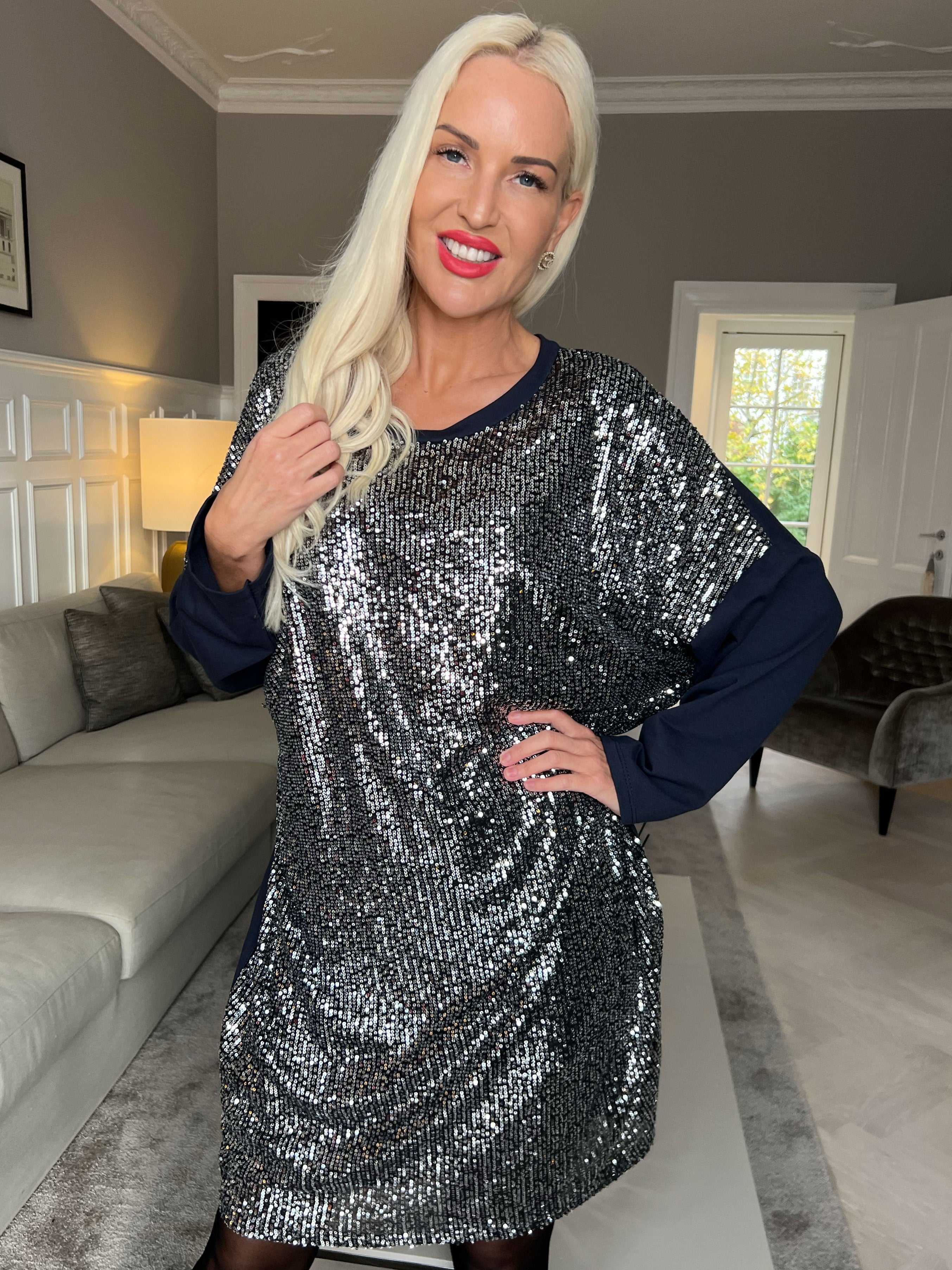 Eria - Klänning med paljetter på framsidan